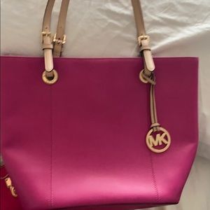Pink Michael kors purse and wallet